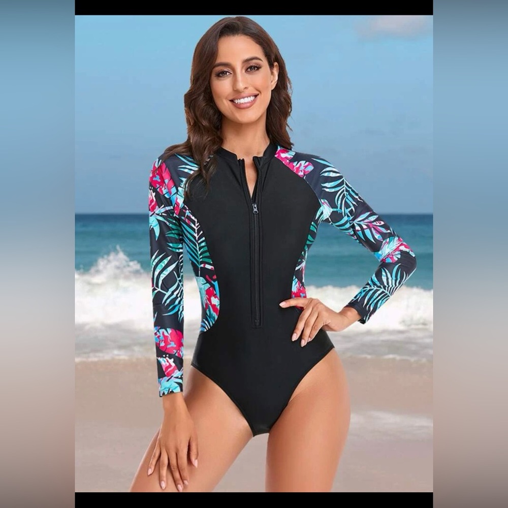 Brand new one piece swimsuit with long sleeves size Large.